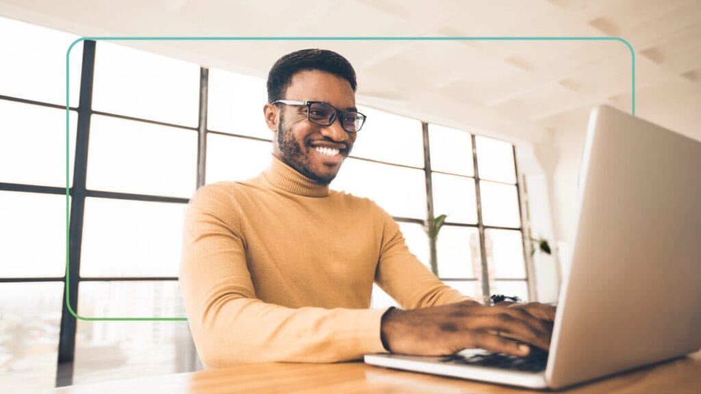 A man appreciating spark features on his LMS platform - Synergy Learning