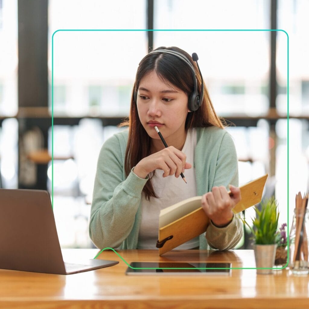 University student studies online using a learning management system from Synergy Learning