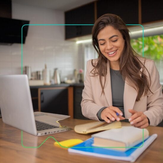 Learning and development professional uses the Synergy Learning customer resource hub on a desktop device
