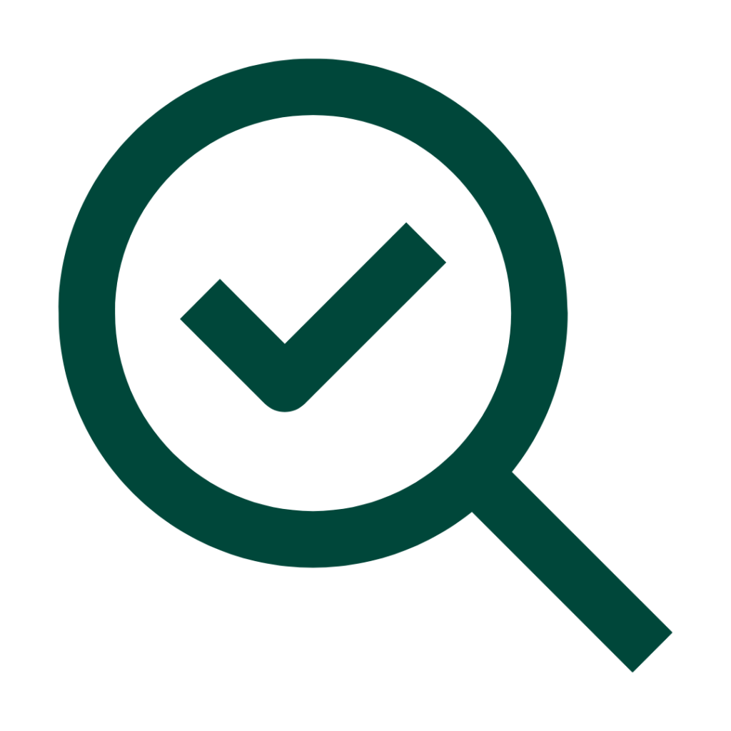 magnifying glass over a tick as an audit preparation challenges icon - synergy learning